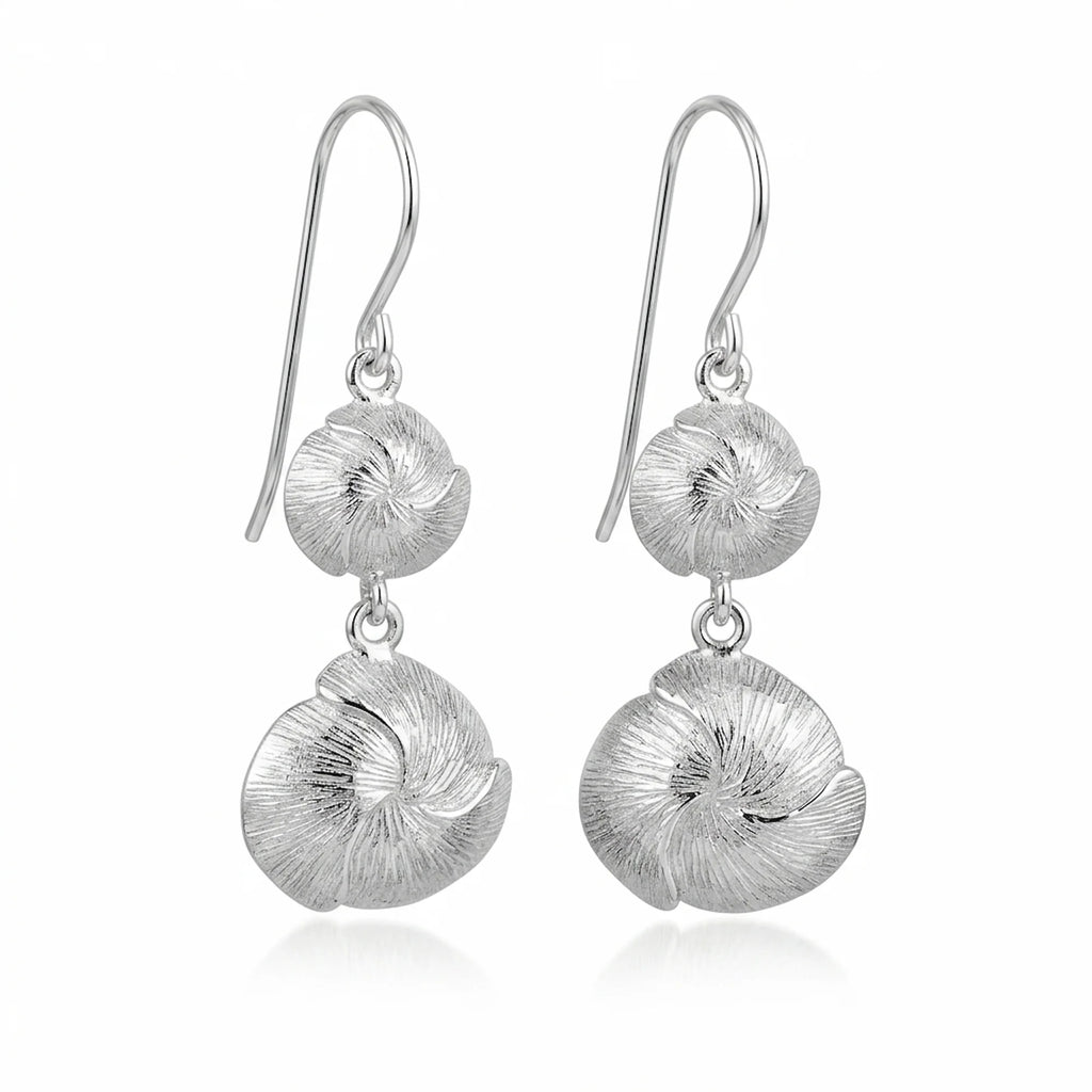 Textured 925 silver drop earrings featuring an organic sculpted design, an October birthday gift in Dubai.