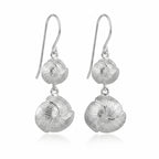 Textured 925 silver drop earrings featuring an organic sculpted design, an October birthday gift in Dubai.