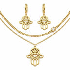Gold-tone jewelry set 925 silver in Dubai, featuring a Hamsa hand pendant necklace, matching Hamsa hand drop earrings, and a double-strand chain necklace with a small clear stone accent, all displayed on a clean white background.