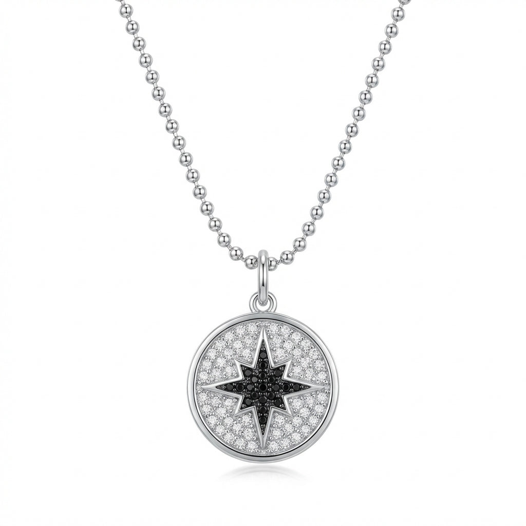Compass Necklace with a star pendant on a white background