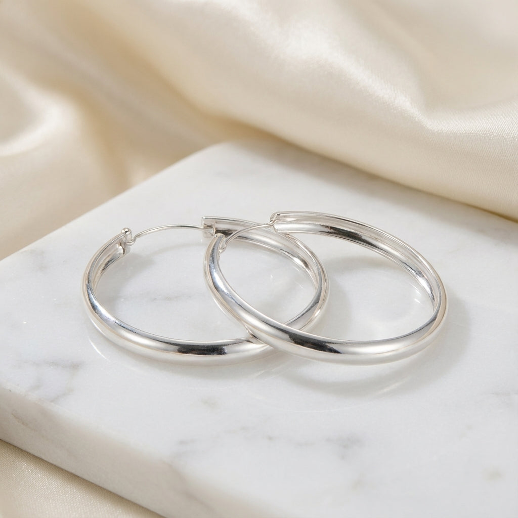 Large sterling silver hoop earrings, Luna Dura Sheikh Zayed Road