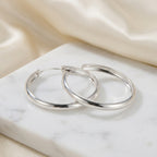 Large sterling silver hoop earrings, Luna Dura Sheikh Zayed Road