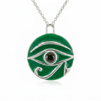 Round silver pendant with green enamel Eye of Horus design and central peridot stone