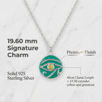 Feature Breakdown Teal pendant necklace with yellow opal gemstone on a white background