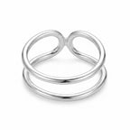 Angled view of double-band 925 silver ear cuff — smooth curves and slip-on structure