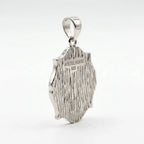 Reverse angled view of a sterling silver Ayat Al Kursi pendant showing textured back and AYETEL KURSI 925 marking.