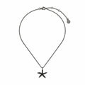 Black cubic zirconia starfish pendant necklace in black rhodium-plated 925 silver, showing its mini rolo chain, lobster clasp and extension links.