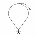 Black cubic zirconia starfish pendant necklace in black rhodium-plated 925 silver, showing its mini rolo chain, lobster clasp and extension links.