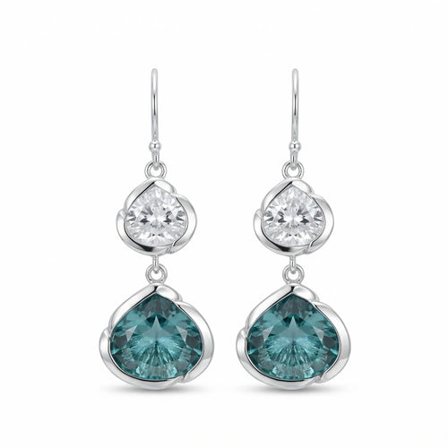 Pair of blue lotus dangle earrings in 925 sterling silver with white and sky blue topaz on a white background in Dubai.