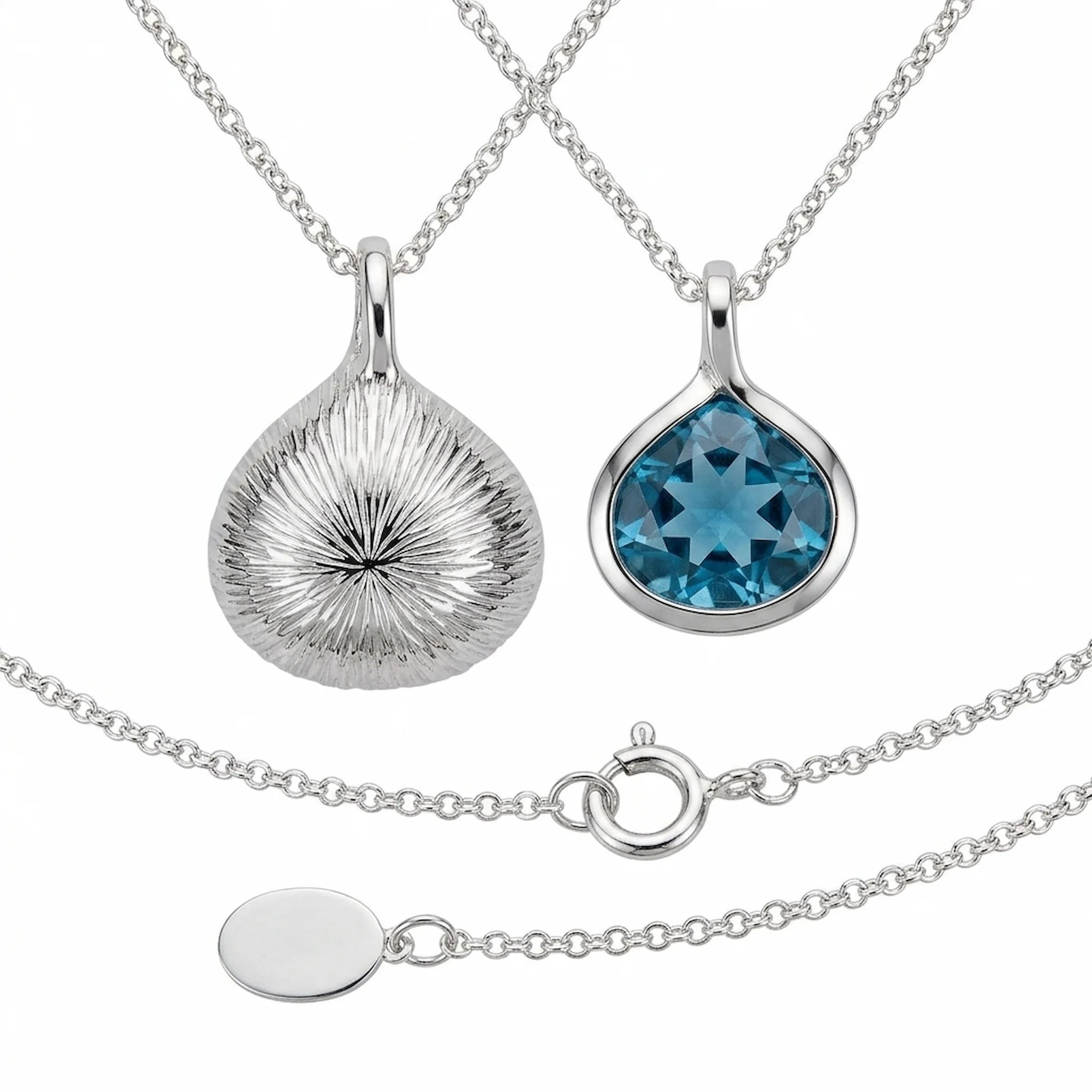 Pear-cut Sky Blue Topaz and engraved 925 silver lotus pendant front and back in Dubai.