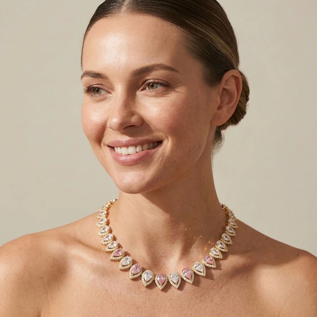 Bride wearing an 18k gold plated bridal choker with alternating blush pink and white cubic zirconia in Dubai.
