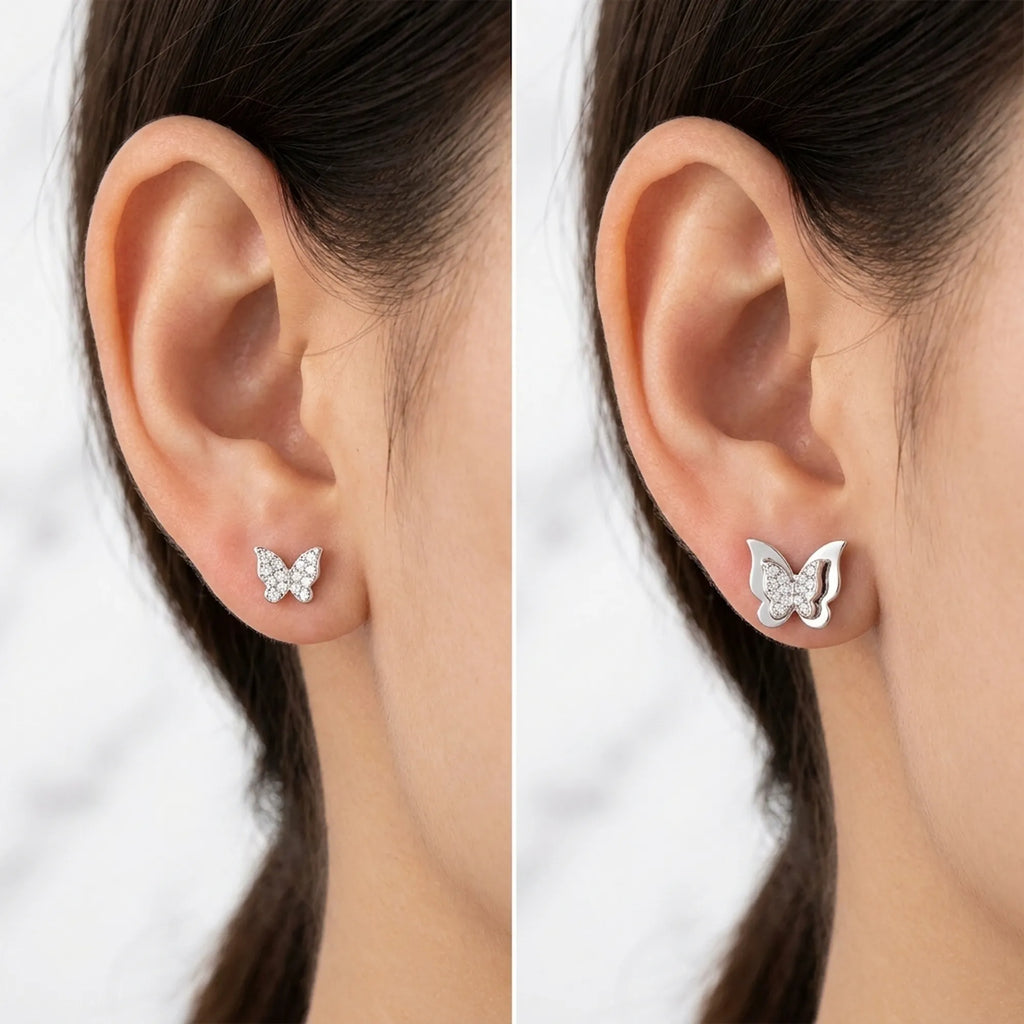 Butterfly stud worn two ways: pave butterfly alone and layered with the silver frame, on the ear, Dubai
