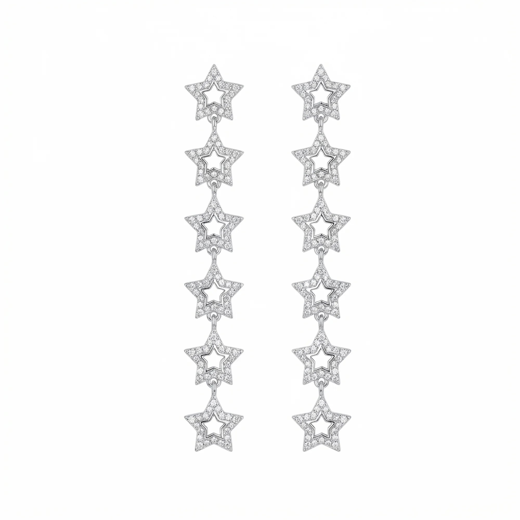 Rhodium plated silver cascading star drop earrings with cubic zirconia and off-white enamel in Dubai.