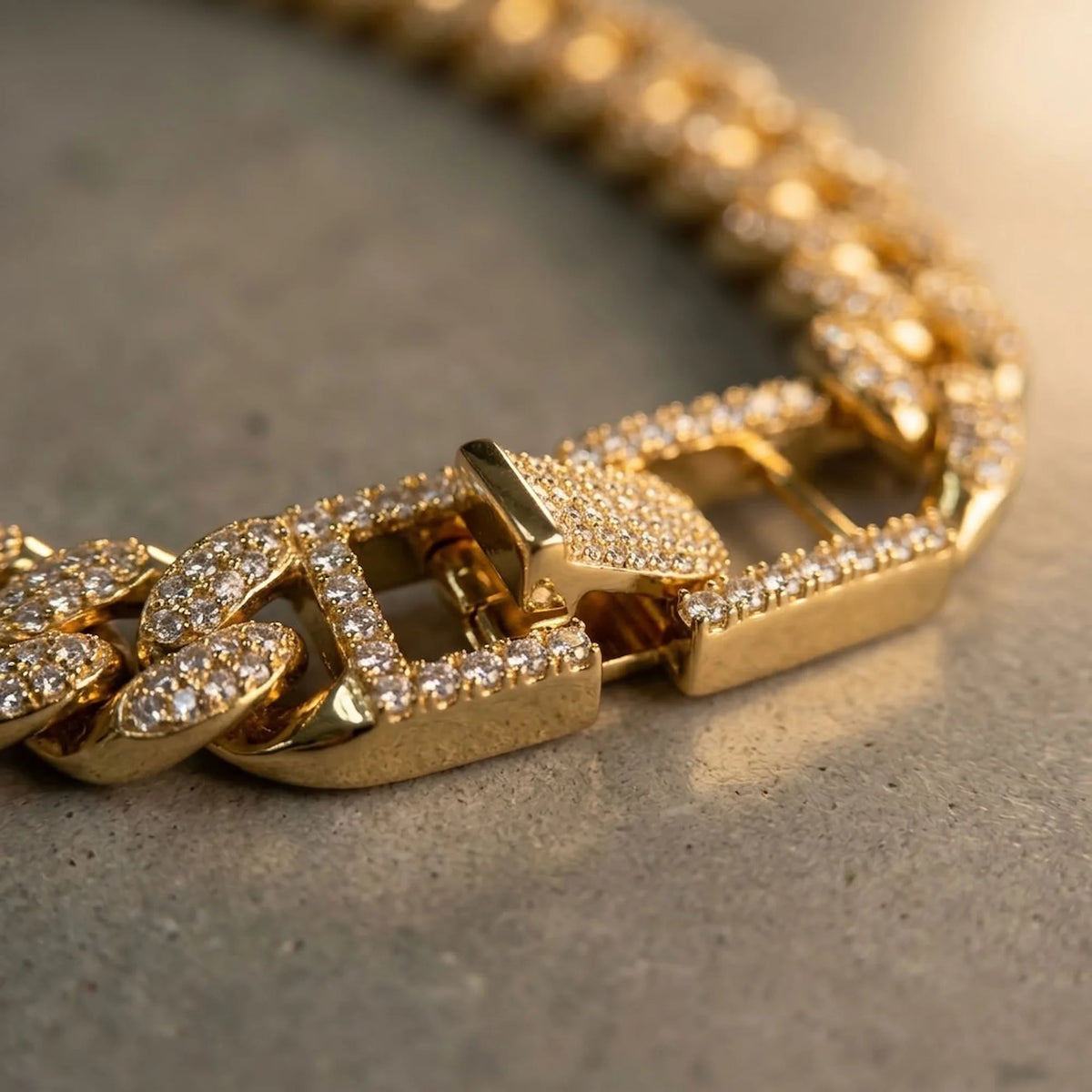 Close-up of the secure clasp on an 18k gold-plated copper pave Cuban necklace with cubic zirconia in Dubai.
