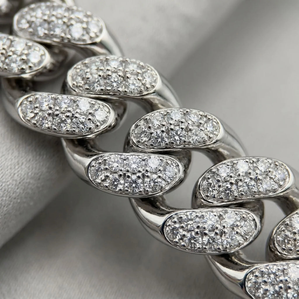 Close-up of cubic zirconia pave setting on a chunky rhodium-plated copper Cuban necklace in Dubai.