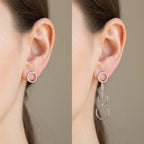 Silver circle drop earrings shown in two configurations: stud-only mode and full cascade drop mode on ear, white background