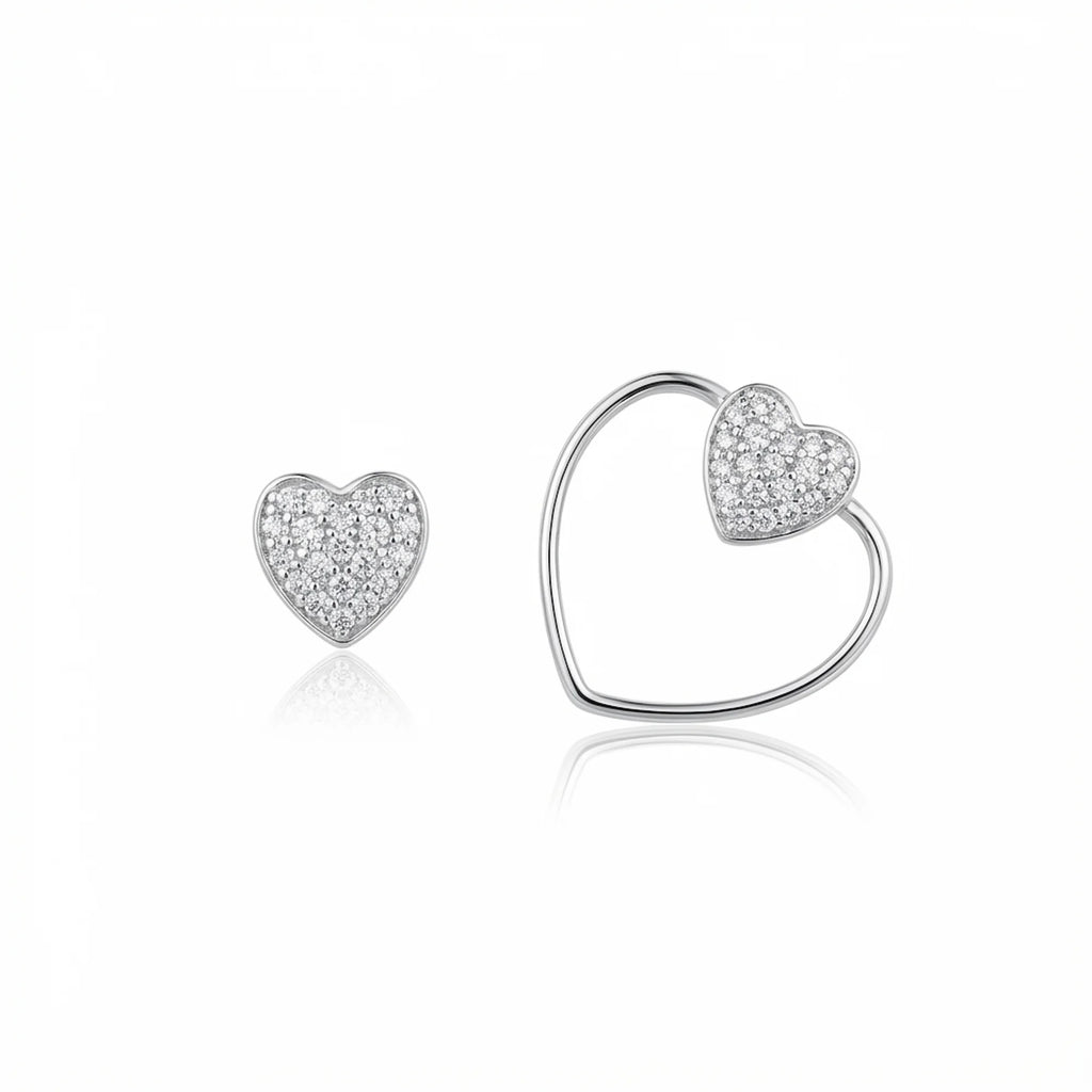 Convertible pavé heart stud earring shown alone and combined with an open heart wire frame, in 925 sterling silver.