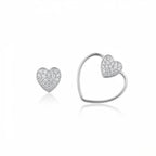 Convertible pavé heart stud earring shown alone and combined with an open heart wire frame, in 925 sterling silver.