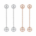 Crescent moon hilal drop earrings in rhodium silver and rose gold on white background in Dubai— 925 sterling silver.