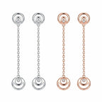 Crescent moon hilal drop earrings in rhodium silver and rose gold on white background — 925 sterling silver, 50mm chain, CZ