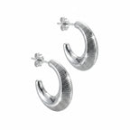 Ribbed 925 sterling silver crescent moon hoop earrings with rhodium plating available in Dubai.