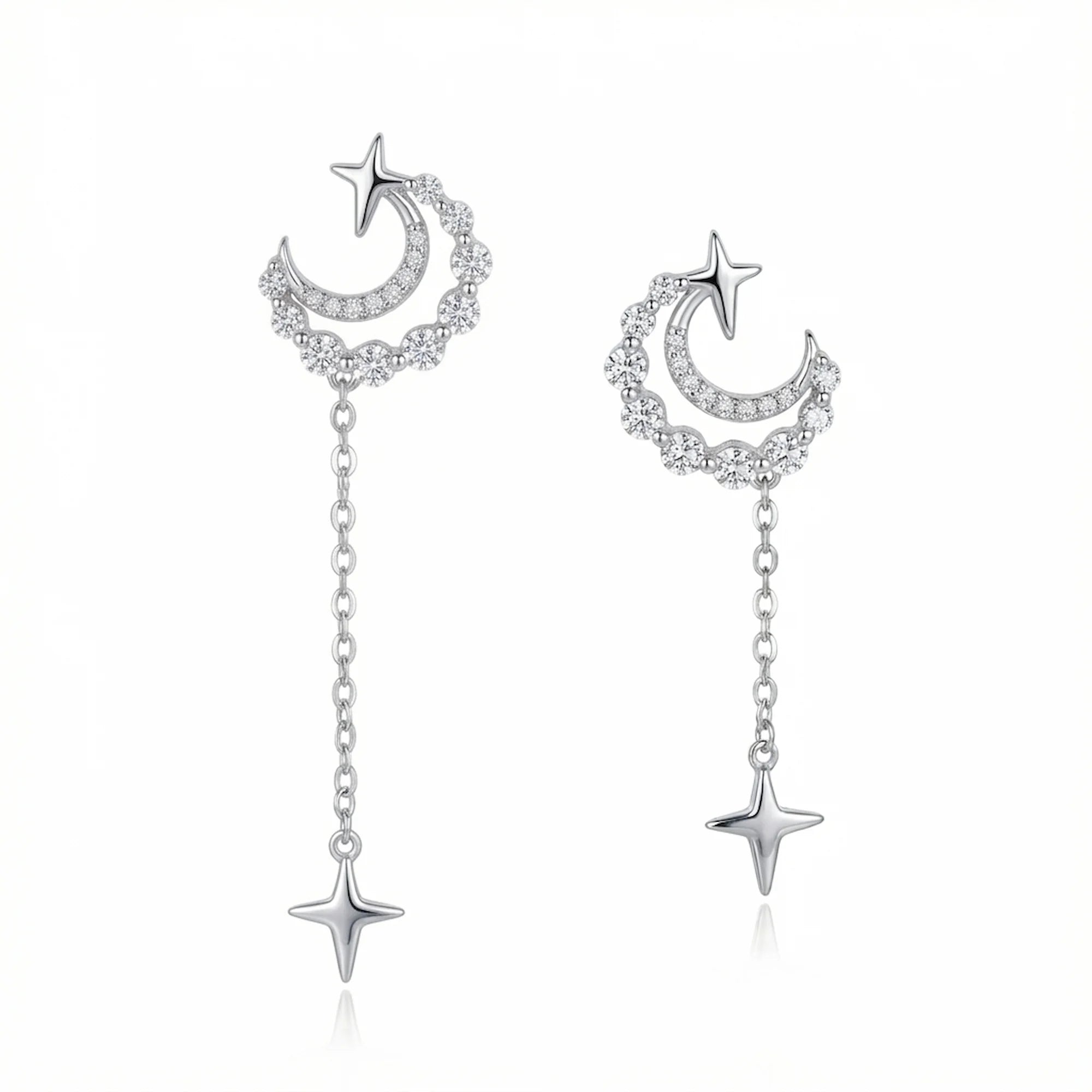 Rhodium plated 925 silver crescent moon and star chain drop earrings with cubic zirconia, offered in Dubai.