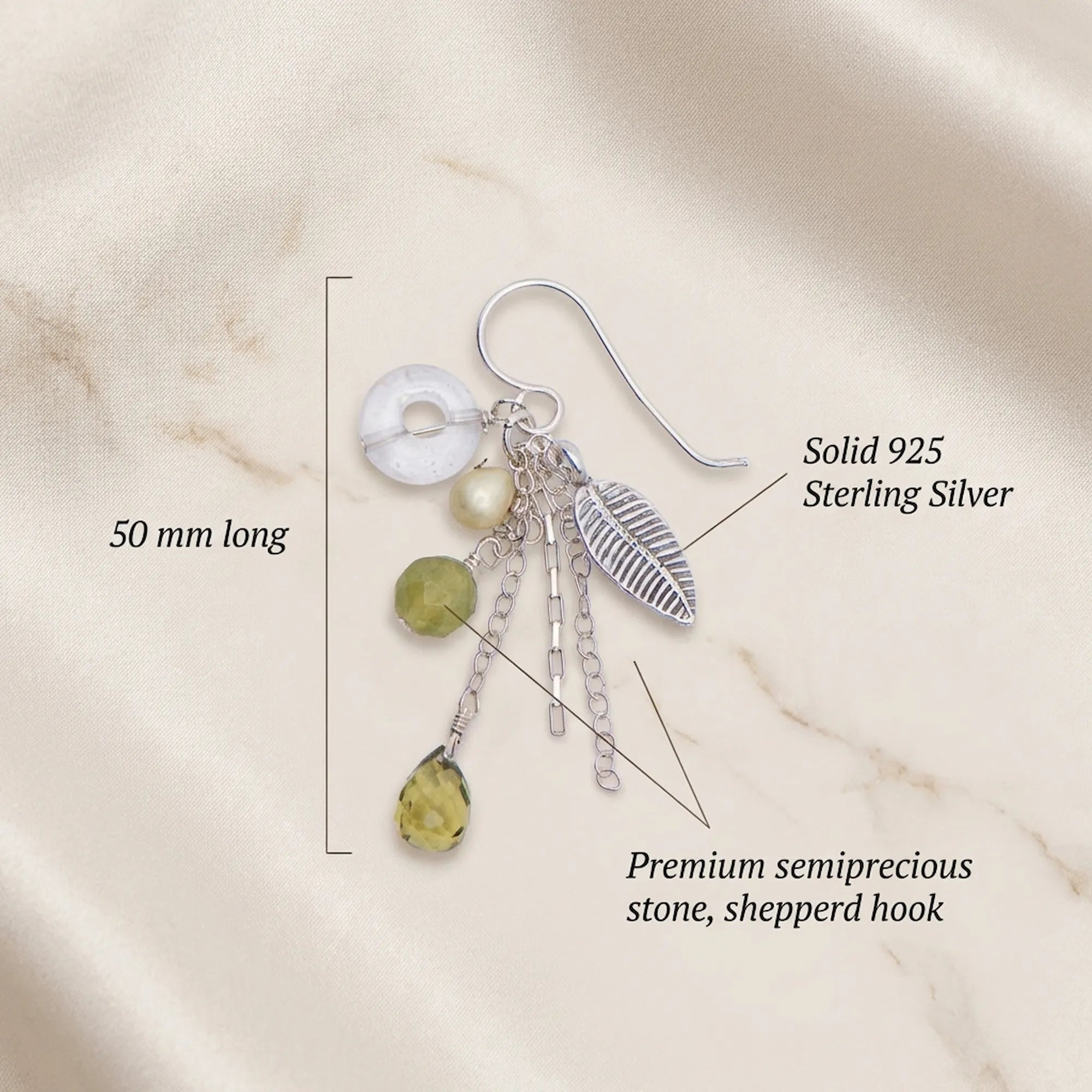 Technical breakdown of our 925 sterling silver leaf chain drop earrings detailing the 50mm length and lime green semiprecious stones.