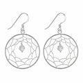 Dreamcatcher drop earrings in 925 sterling silver with hand-woven wire web and cubic zirconia bead, white background in Dubai.
