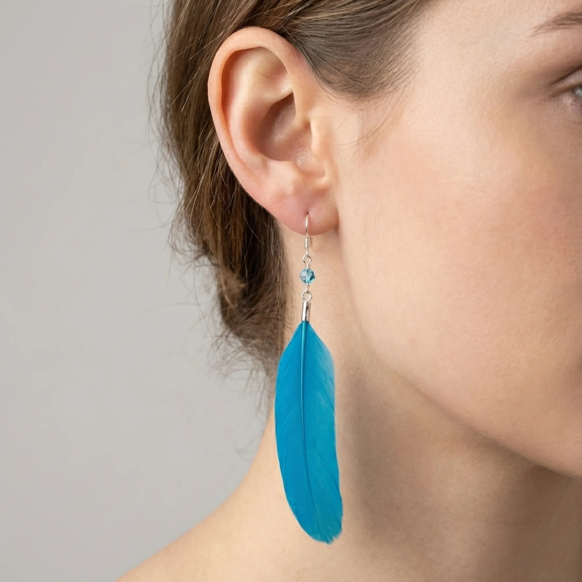 Electric blue feather drop earrings full length — 8–10cm shoulder-grazing natural feather dangle