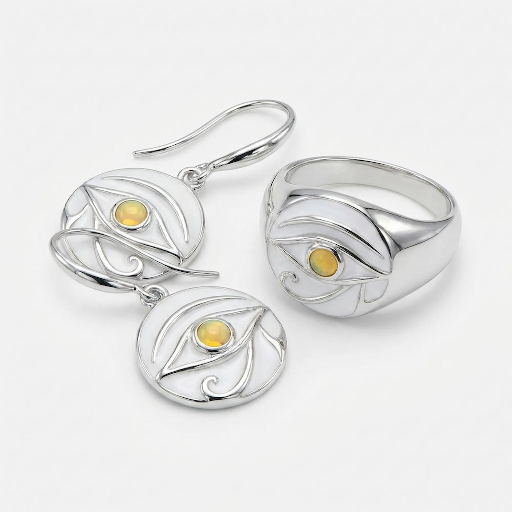 Certified yellow fire opal and white enamel ring and earrings set on white