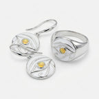 Eye of Horus yellow opal ring and earrings set, white enamel, 925 sterling silver, white background
