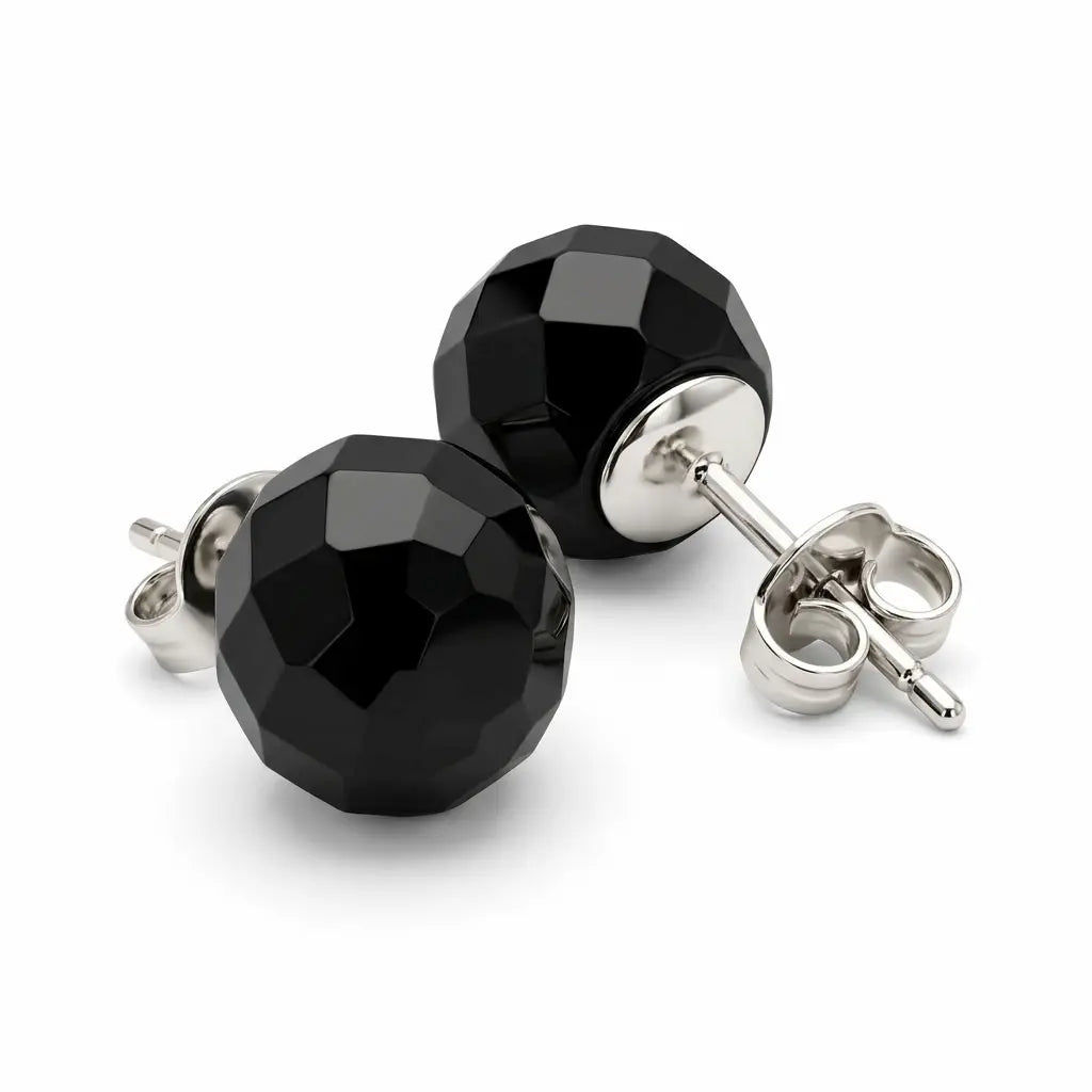 Pair of faceted black 10 mm resin sphere stud earrings with sterling silver posts and butterfly backs on a white background.