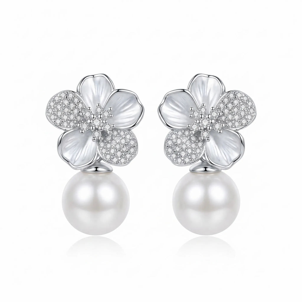 Pure white background showing the front face of floral pearl drop earrings dubai.