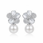 Pure white background showing the front face of floral pearl drop earrings dubai.