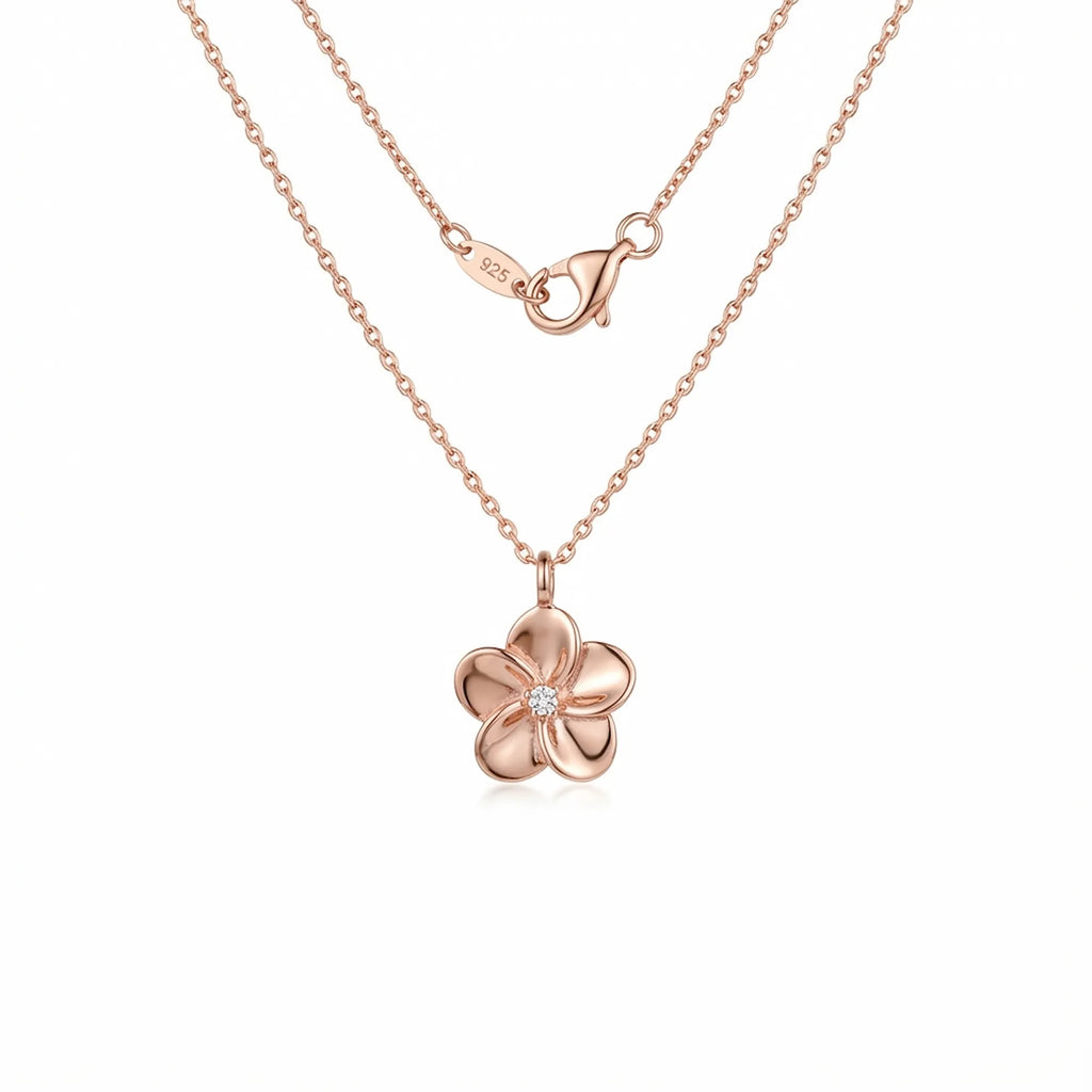 Rose gold floral pendant necklace with CZ centre on white background — 925 sterling silver chain and lobster clasp