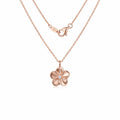 Rose gold floral pendant necklace with CZ centre on white background — 925 sterling silver chain and lobster clasp