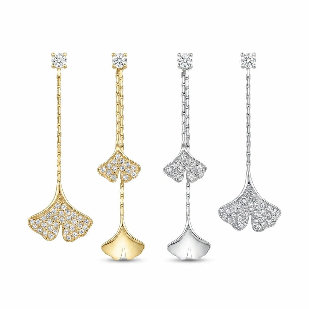 Ginkgo leaf mismatch drop earrings in gold and rhodium silver, all four variants face-forward on white background