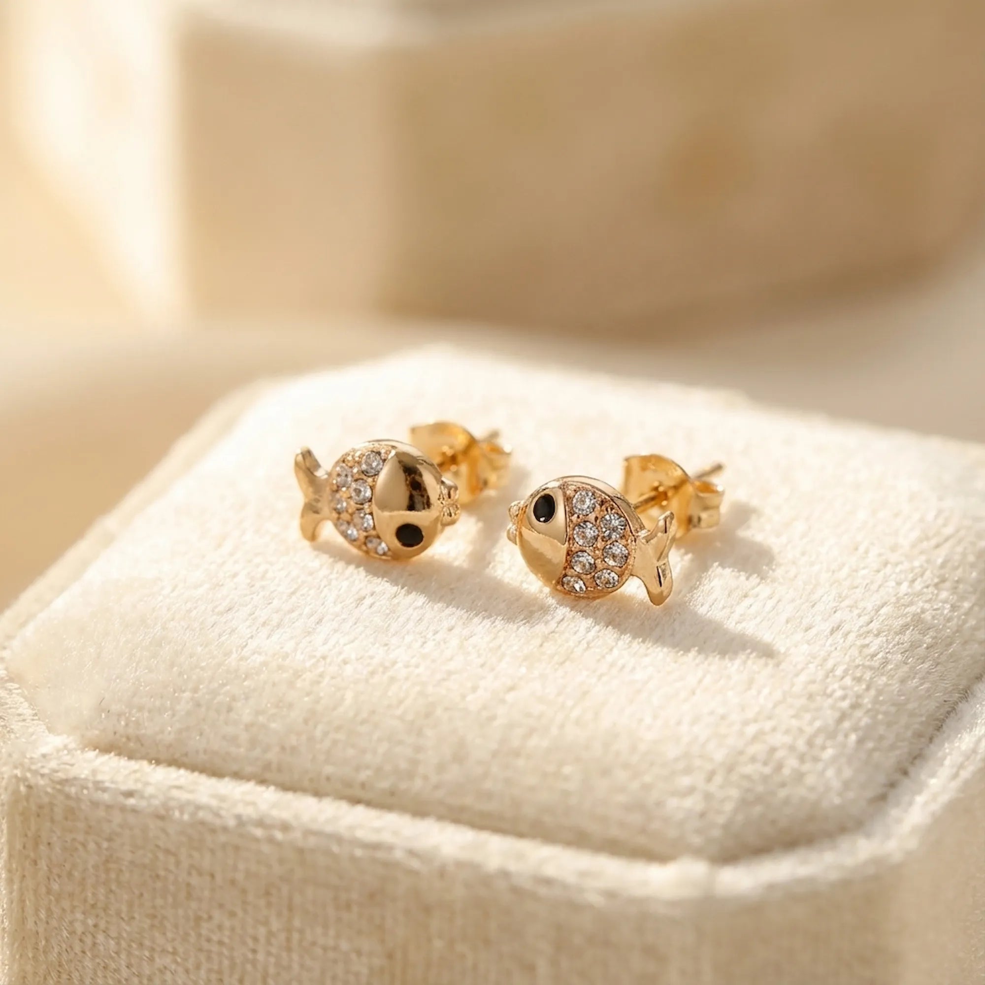 Goldfish stud earrings in cream velvet jewelry box — gold-plated 925 silver gift-ready presentation