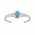 Azure blue enamel Hamsa hand cuff bangle in 925 sterling silver with tanzanite eye, white background