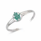 Teal enamel Hamsa hand cuff bangle in 925 sterling silver with genuine opal centre, white background