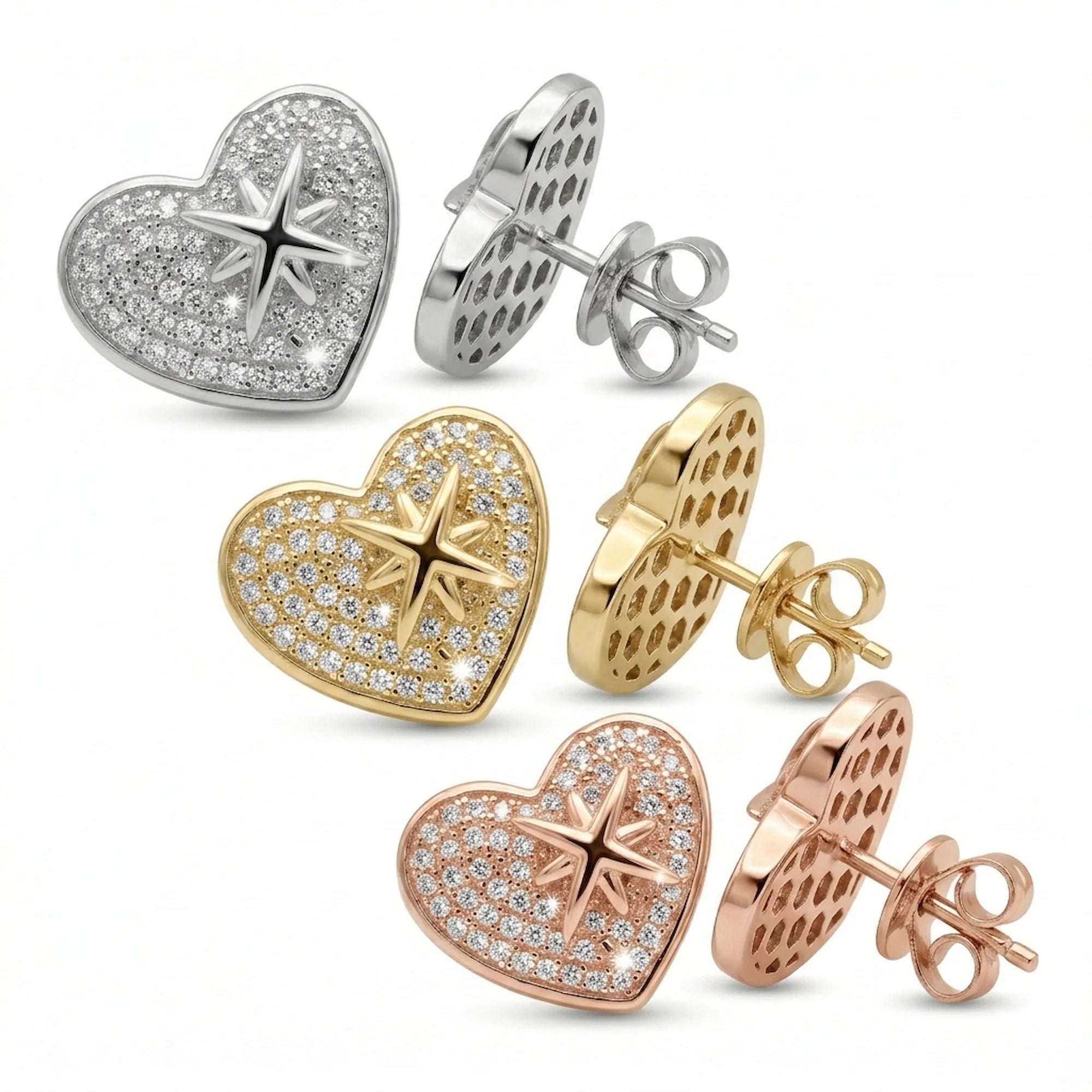 Rhodium, gold, and rose gold 925 silver pavé heart earrings with cubic zirconia arranged in Dubai.
