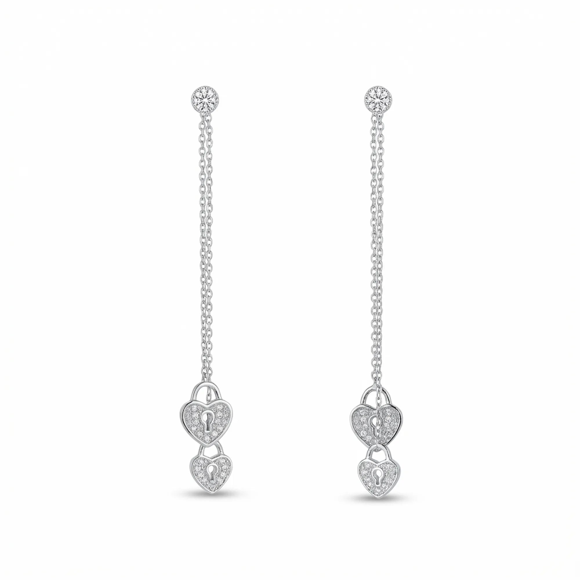 Heart lock drop earrings showing both configurations — full double lock 80mm drop left, single lock solo drop right, rhodium 925 silver dual wear
