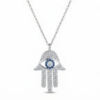 Silver hamsa pendant necklace with blue and white cubic stones on chain