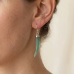 Green aventurine horn dangle earring worn on model — 925 silver shepherd hook, natural stone, neutral background