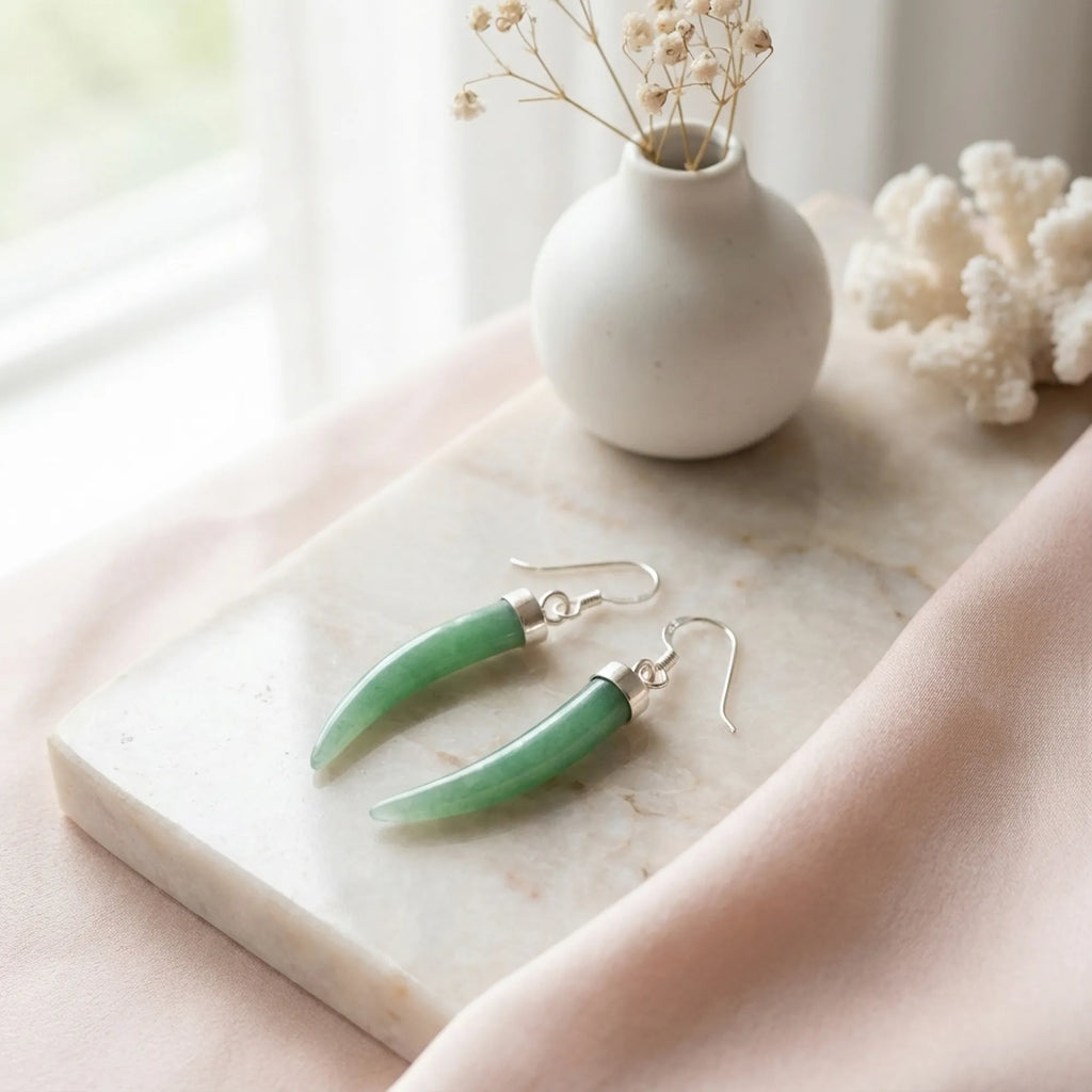 Green aventurine horn dangle earrings on marble tray — 925 silver cap, natural stone flat lay Dubai Luna Dura