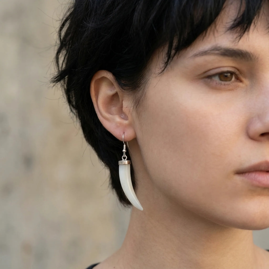 Mother of pearl horn dangle earring worn on model — 925 silver shepherd hook, luminous white natural stone UAE