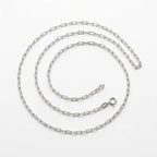 Italian-made 925 sterling silver paperclip chain with elongated rectangular links and spring-ring clasp, arranged on white.