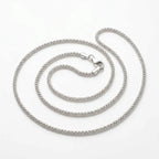 Italian-made 925 sterling silver round popcorn chain with closely textured links and lobster clasp against a white background.