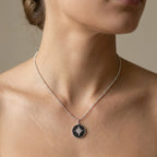 Female model wearing the Luna Dura Polaris 925 silver necklace, demonstrating the perfect collarbone fit and pendant scale jewelry dubai.