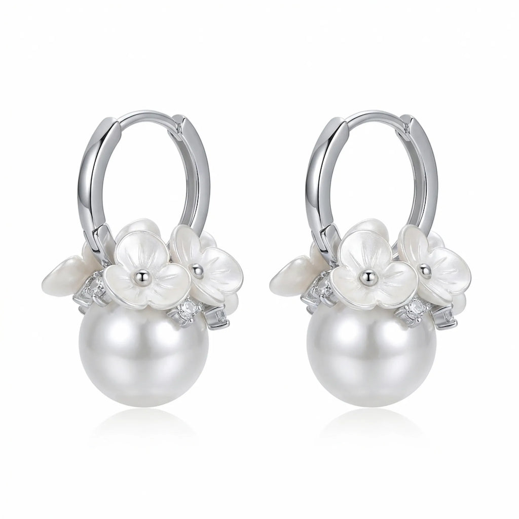 Shop our stunning ladies artificial earrings featuring a simulated pearl and cubic zirconia set in rhodium-plated silver.